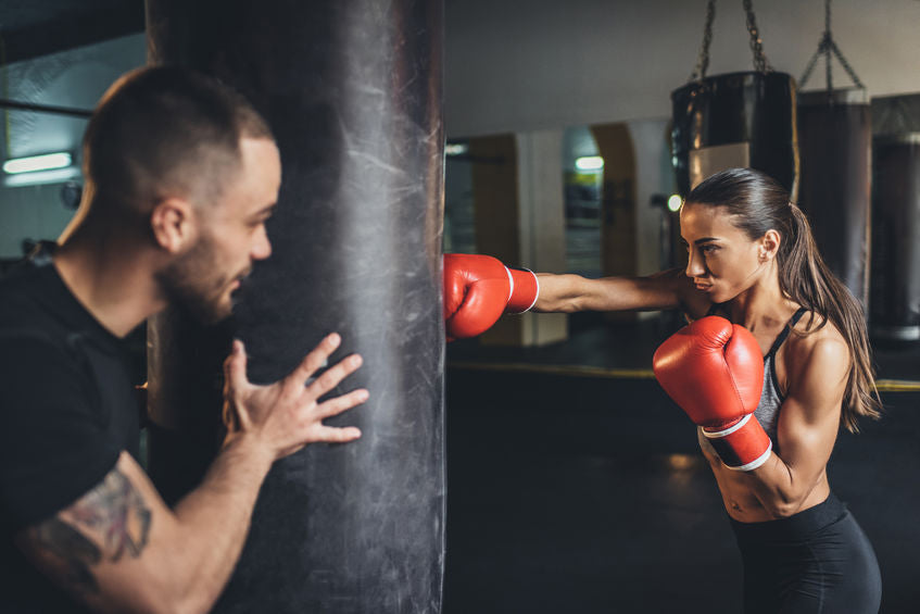 séance de boxe avec coach sportif