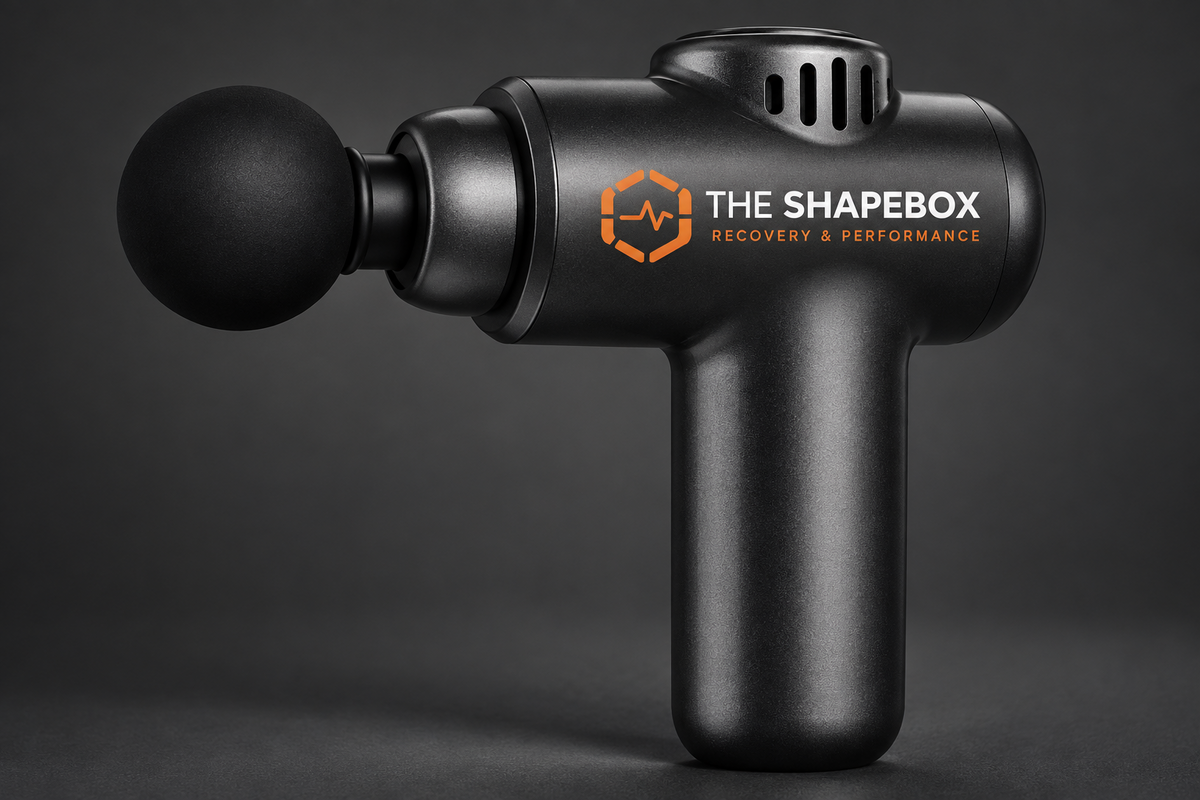 Pistolet de massage mini Shapebox Go gris anthracite, logo The Shape Box Recovery & Performance sur le flanc