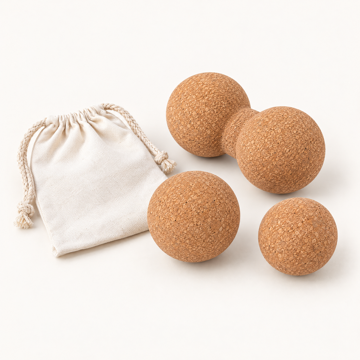 Set de trois balles de massage en liège naturel et sa pochette en coton