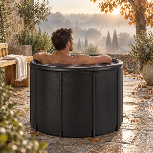 Bain froid portable Shapebox Ice installé sur une terrasse en pierre un matin d'automne